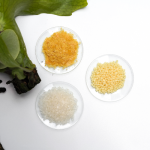 What are the benefits of using citric acid in candelilla wax extraction?